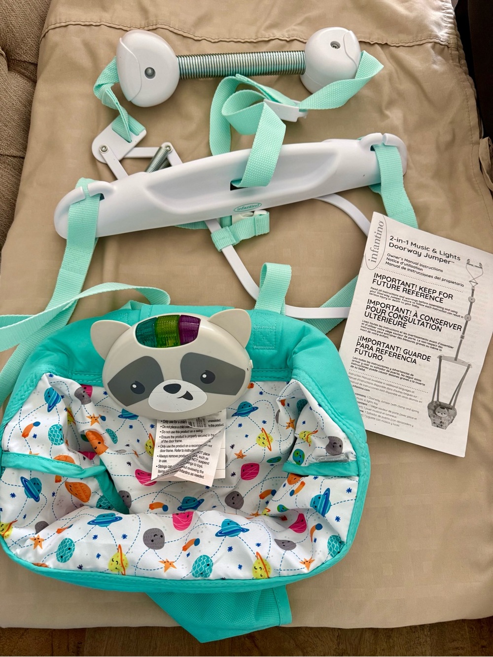 Unbranded Kids Doorway Jumper in Teal with Raccoon Toy